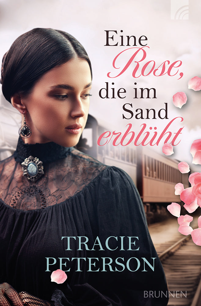 Eine Rose. die im Sand erblüht